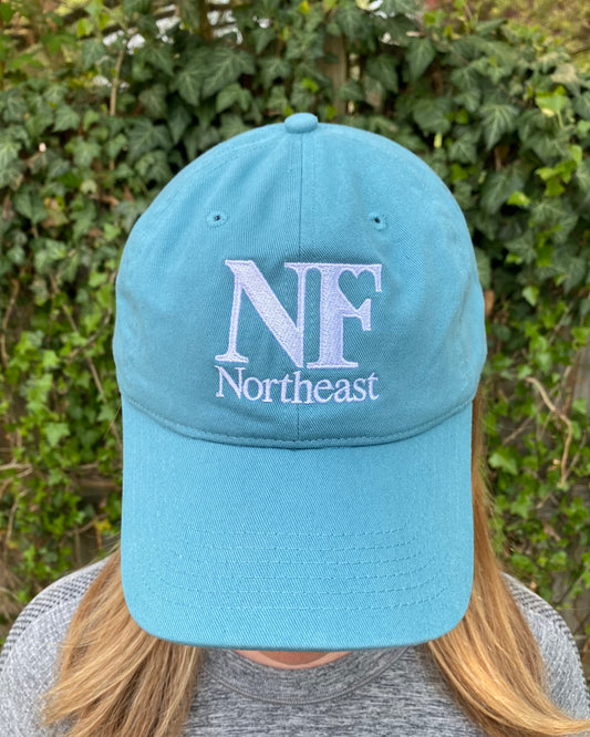 image of teal baseball cap from front with NF Northeast logo embroidered