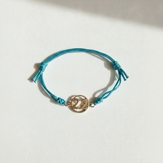 NF Northeast Adjustable Bracelet – “22” (Teal Cord)